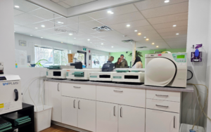 Detailed photo of Tribal Expression’s sterilization machines in the publicly viewable sterilization room, showing autoclaves actively used for individual sterilization cycles for body piercing tools and jewelry