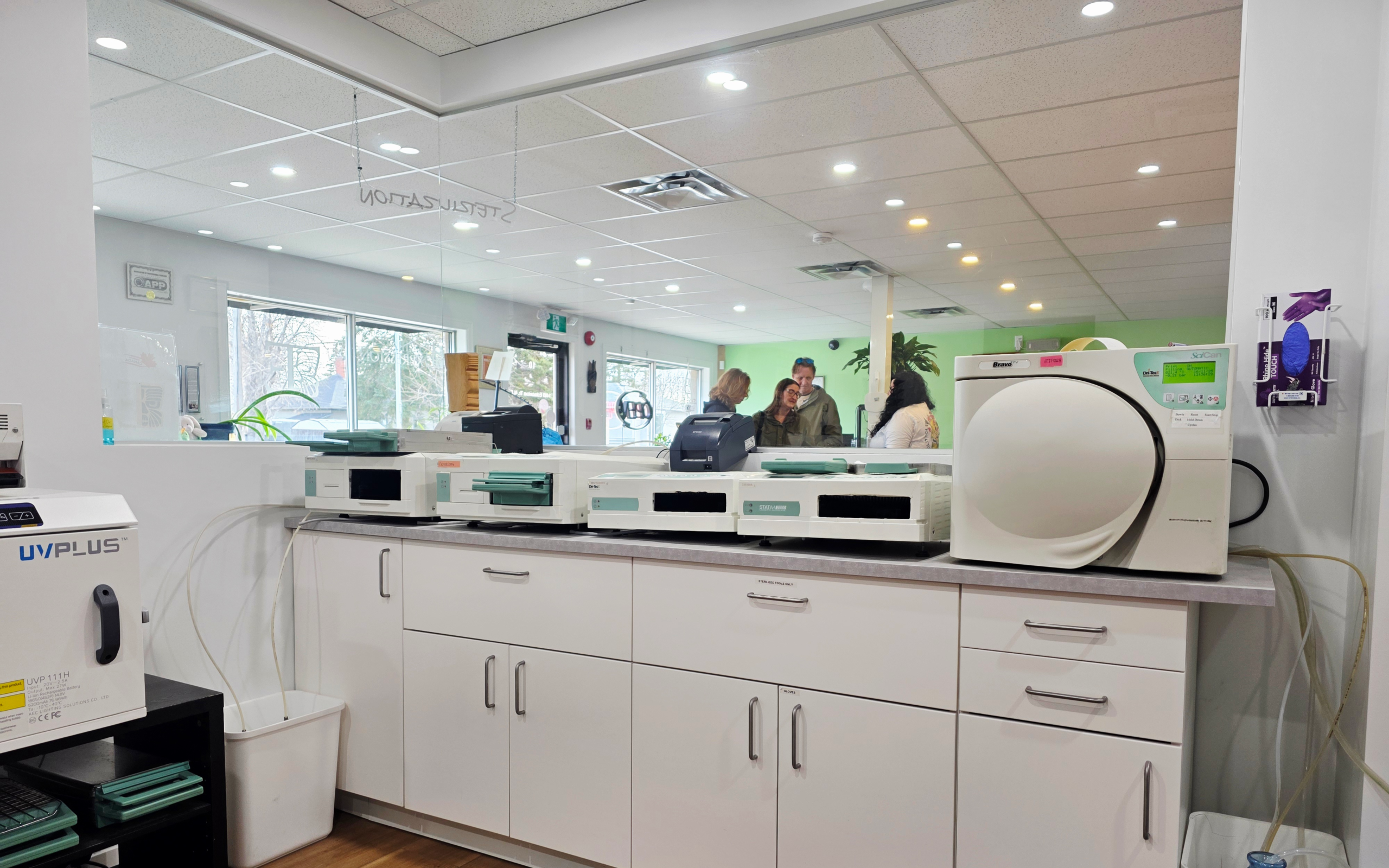 Detailed photo of Tribal Expression’s sterilization machines in the publicly viewable sterilization room, showing autoclaves actively used for individual sterilization cycles for body piercing tools and jewelry