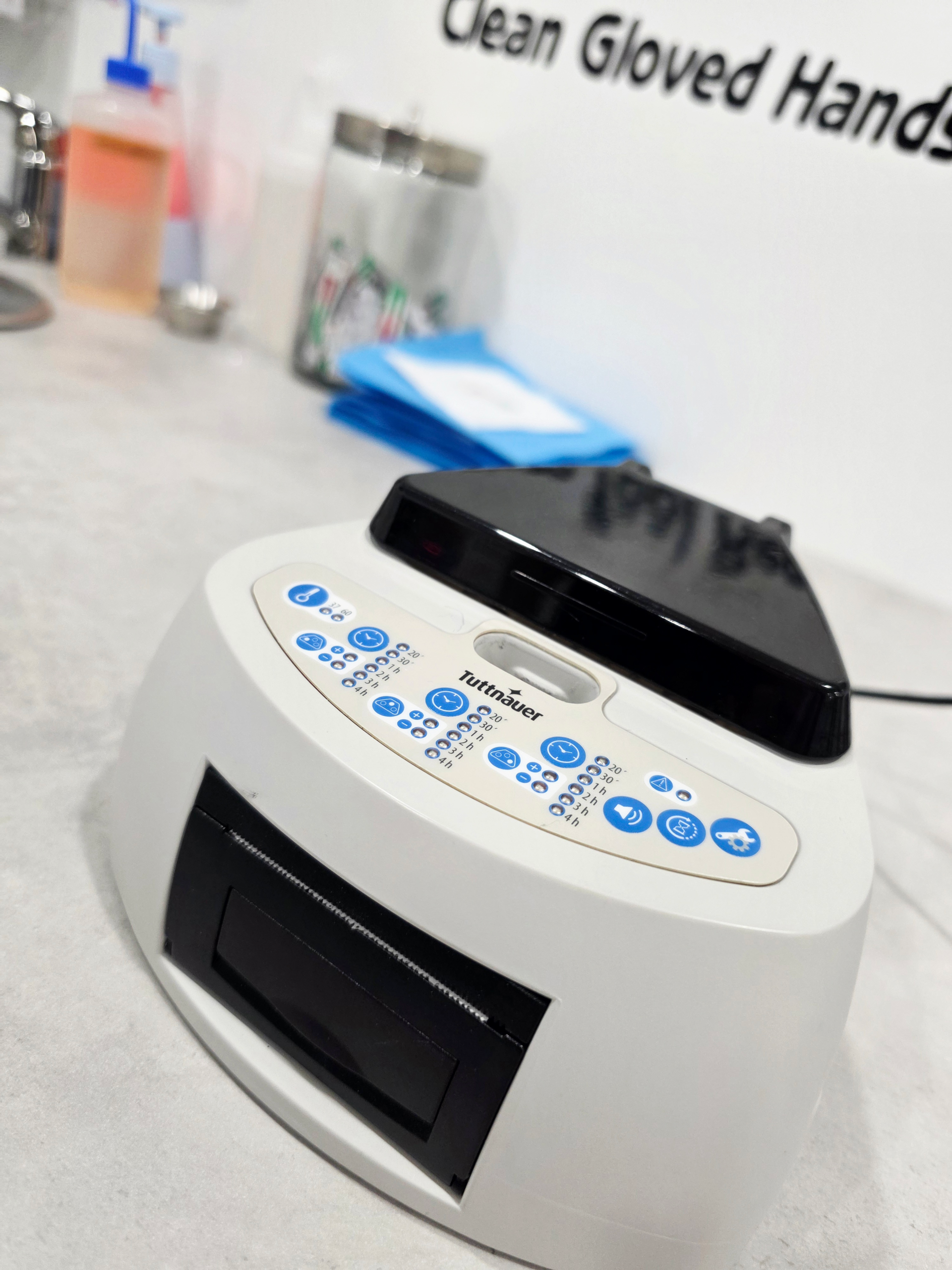 Close-up photo of Tribal Expression’s biological testing unit made by TeraGene, used to verify autoclave sterilization effectiveness and ensure safe, professional piercing practices in Calgary